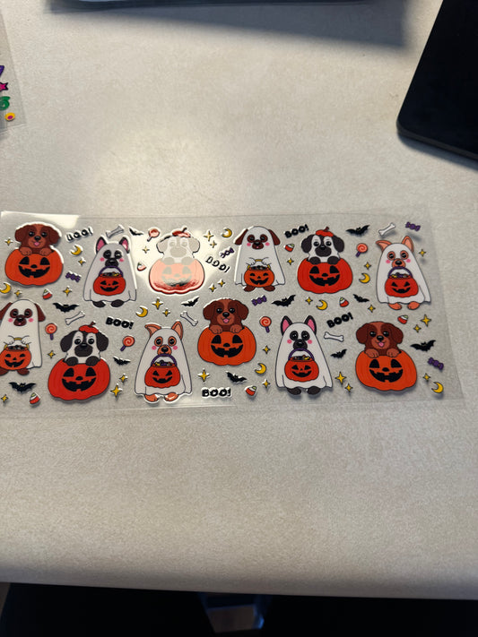 Dogs as ghost and pumpkins